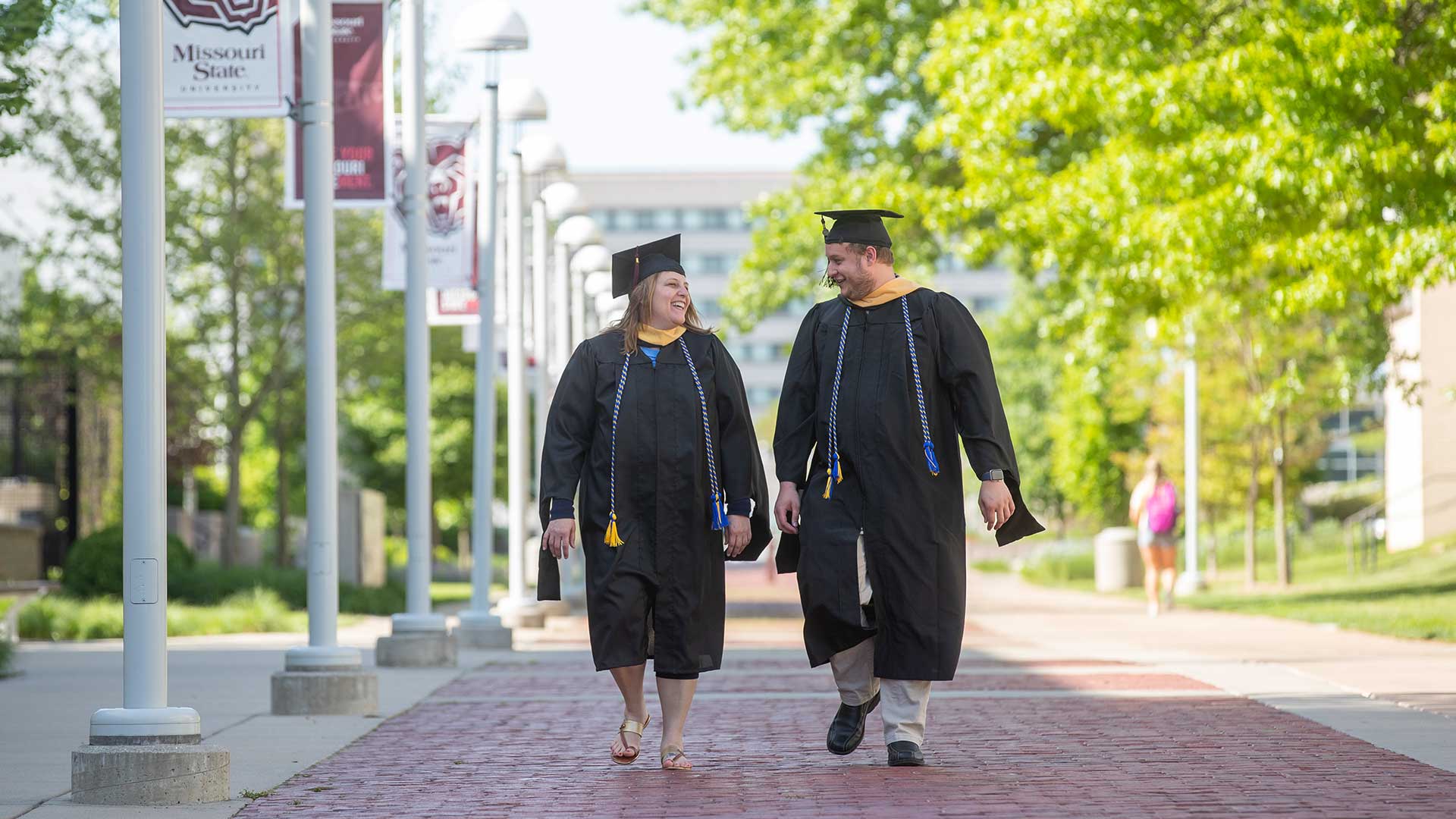 Mother and son, Jayma and Ethan Potter graduated with master’s degrees in social work in the same ceremony. 